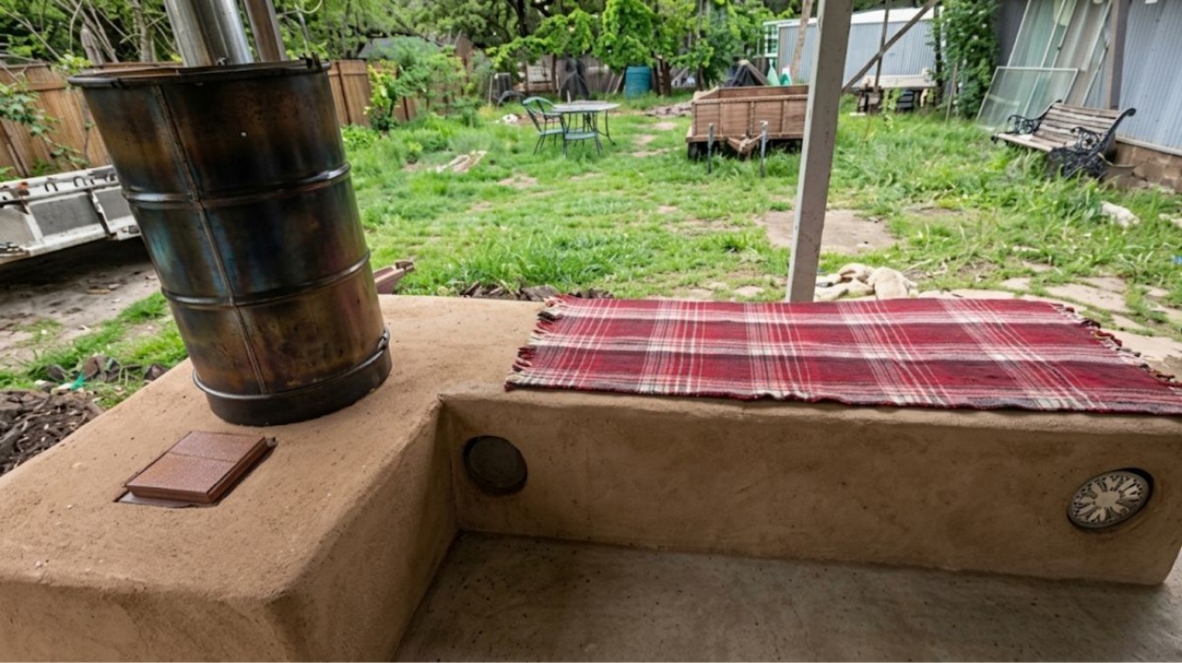 Raketová kamna na zimní zahradě